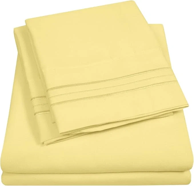 Optimized California King Size Sheet Set with Built-in Sheet Straps - Deep Pocket Fitted Sheet Flat Sheet amp Pillowcases - Soft Wrinkle- Secure Fit - Pale Yellow Premium Material