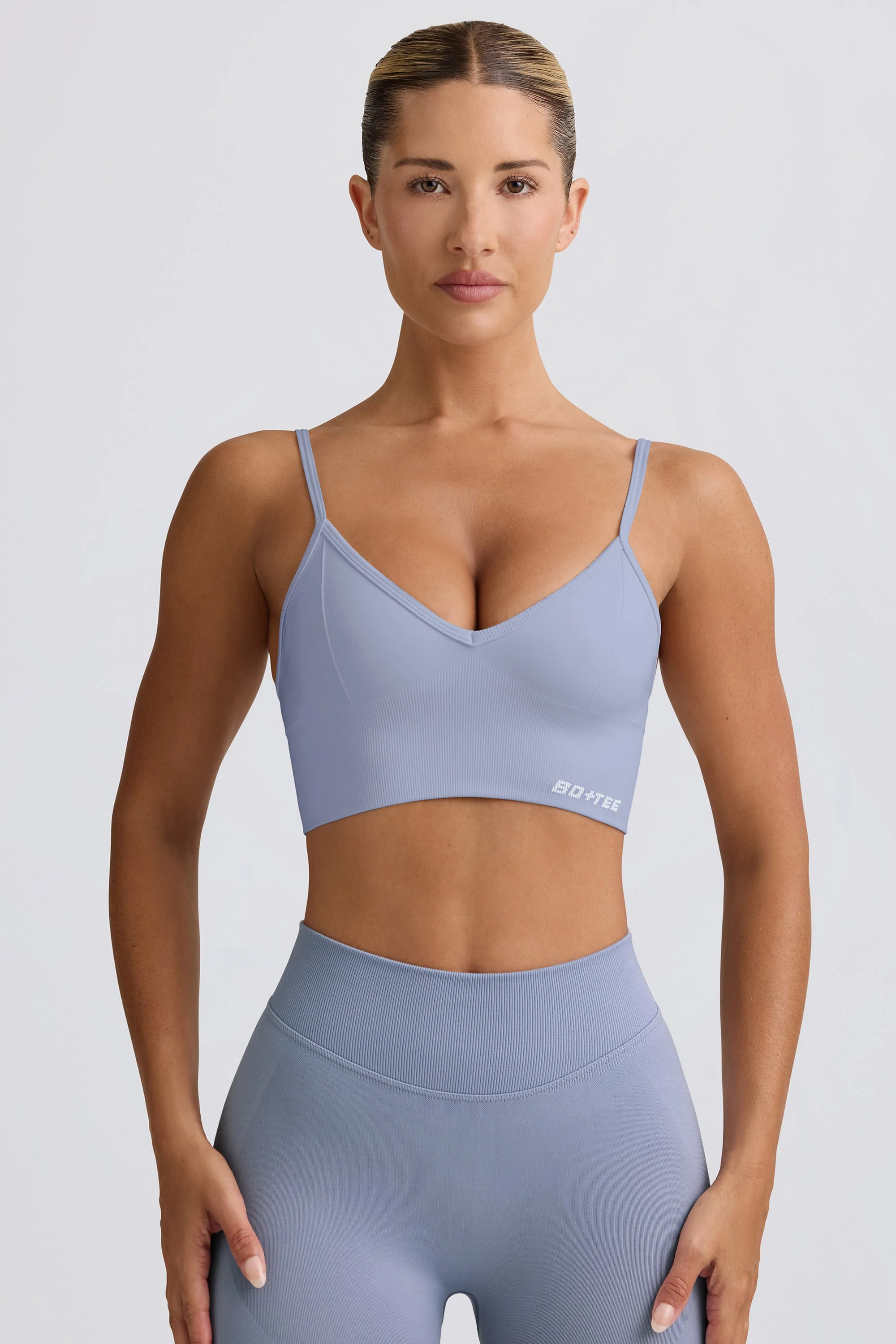 Solid Define Luxe V-Neck Sports Bra in Blue Grey Excellent